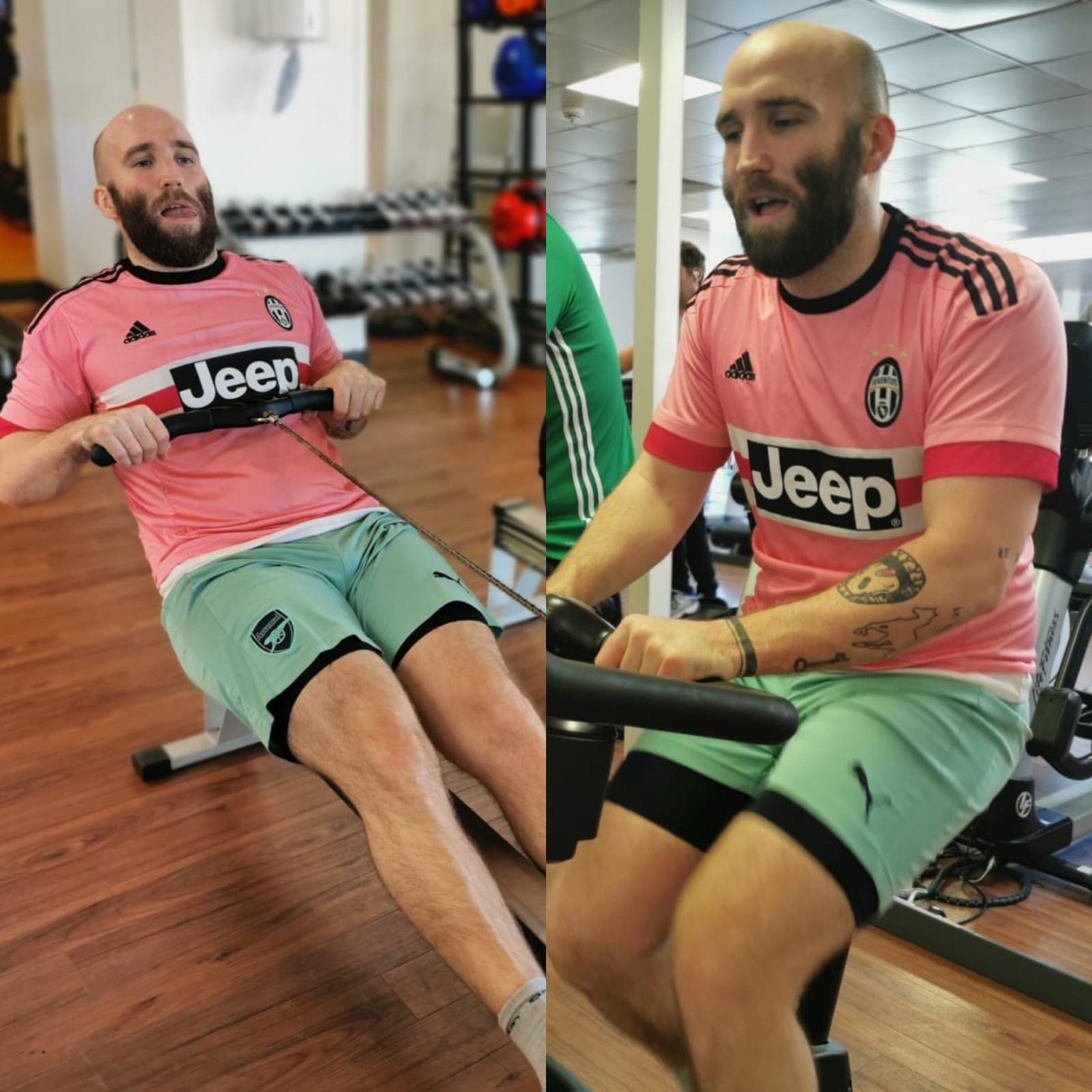 man on rowing machine