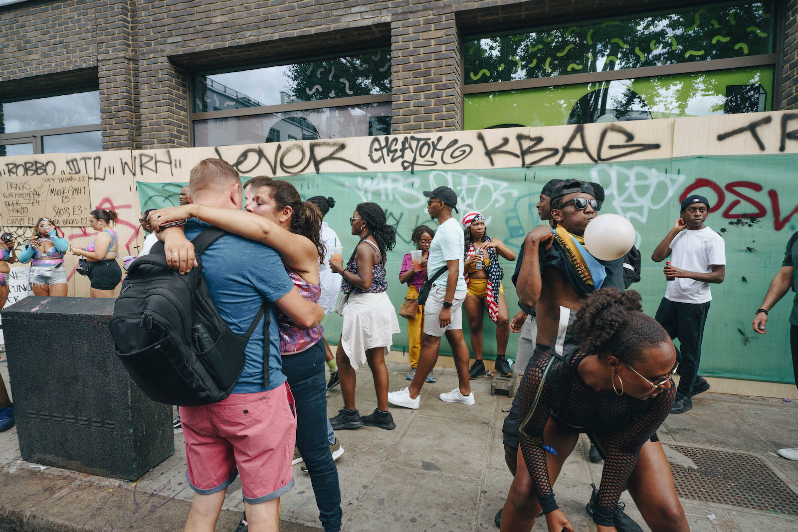 Crowds dancing and embracing at Notting Hill Carnival 2022